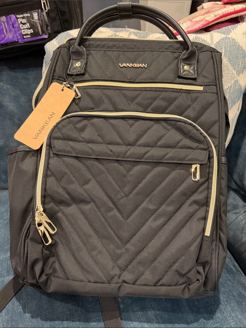 Vankean Women's Quilted Black Backpack with Gold Accents